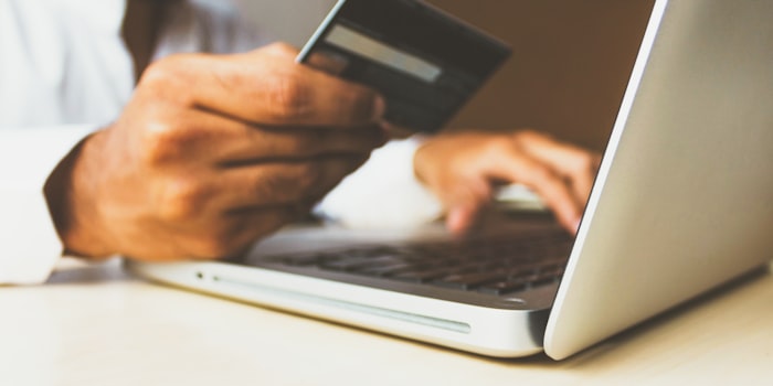 Card payment being completed on a laptop